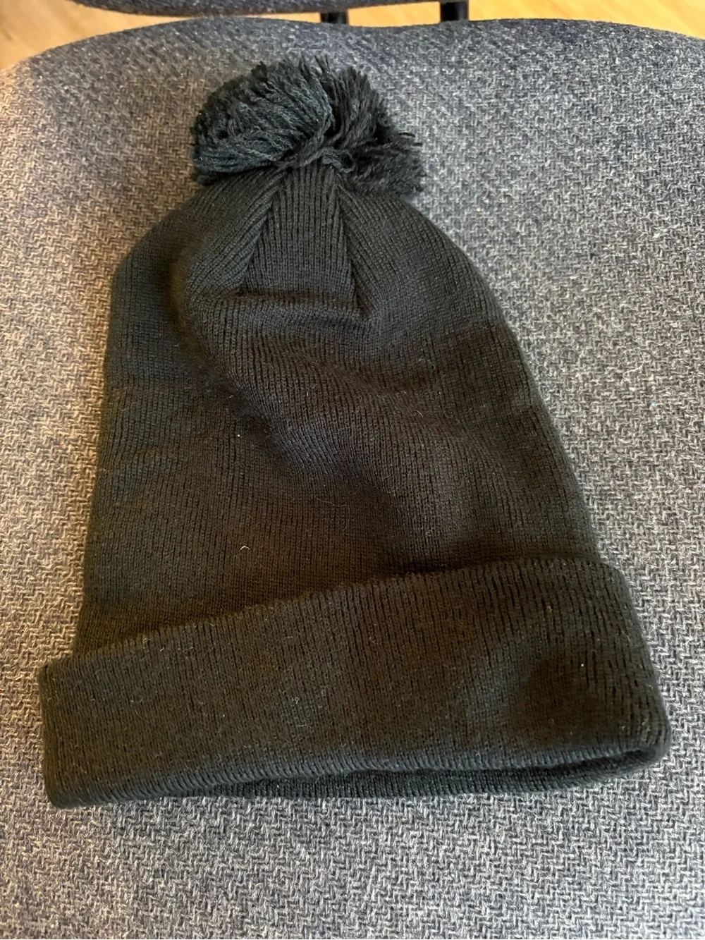 “ERASURE” Black Pom Pom Beanie